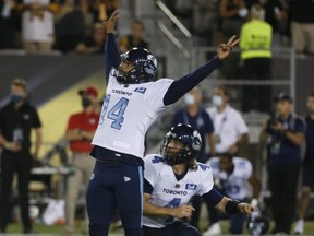 Toronto Argonauts’ Boris Bede kicks a field goal at the end of the fourth quarter to win the game 24-23 in Hamilton yesterday. Jack Boland/Toronto Sun