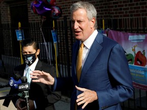 New York City Mayor Bill de Blasio speaks during a news conference after greeting students for the first day of in-person pre-school following the outbreak of the coronavirus disease (COVID-19) in the Queens borough of New York City, U.S., September 21, 2020.