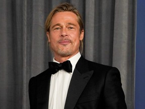 Brad Pitt poses in the press room at the Oscars, in Los Angeles, April 25, 2021.
