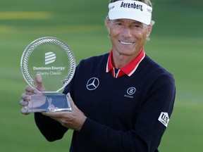 Bernhard Langer holds his trophy after winning the Dominion Energy Charity Classic golf tournament at Country Club of Virginia on Sunday, Oct. 24, 2021, in Richmond, Va.