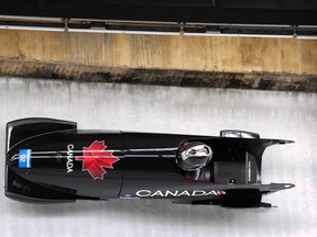 Cynthia Appiah of Canada competes in the women's monobob during an IBSF Sanctioned Race, a test event for the 2022 Winter Olympics, at the Yanqing National Sliding Center in Beijing, Monday, Oct. 25, 2021.