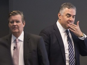 Rogers President and CEO Joe Natale, right, and Chair of the Board Edward Rogers attend the company's AGM in Toronto on Thursday, April 18, 2019.