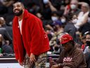 Drake attends a preseason NBA game between the Toronto Raptors and the Houston Rockets on Oct. 11, 2021.  
