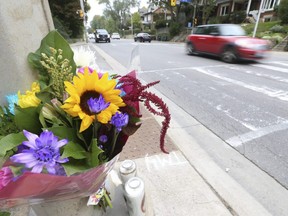 A memorial of flowers and candles were laid near where a 71-year-old man and 69-year-old woman were killed in a multi-car collision on Oct. 12 on Parkside Dr.