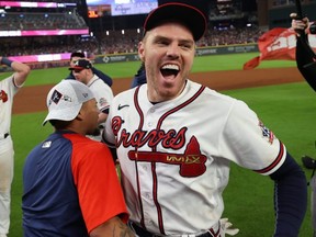 Freddie Freeman celebrates after leading the Atlanta Braves to an NLDS series win over the Milwaukee Brewers. GETTY IMAGES