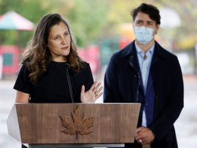 Prime Minister Justin Trudeau and Deputy Prime Minister and Minister of Finance Chrystia Freeland take part in a news conference outside the Children's Hospital of Eastern Ontario in Ottawa, Oct. 21, 2021.