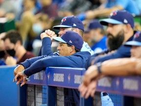 Blue Jays manager Charlie Montoyo looks on as his team plays the Baltimore Orioles in the eighth inning at the Rogers Centre on Sunday, Oct. 3, 2021 in Toronto.