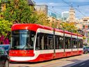 Modern tram in Toronto in a sunny day, Ontario, Canada