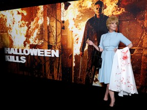 Cast member and executive producer Jamie Lee Curtis poses at premiere for the film Halloween Kills at the TCL Chinese Theatre in Hollywood October, 12, 2021.