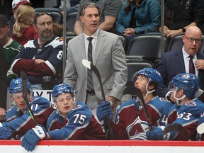 Head coach Jared Bednar of the Colorado Avalanche watches as his team plays the Minnesota Wild at Ball Arena on September 30, 2021 in Denver, Colorado.