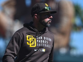 San Diego Padres manager Jayce Tingler walks back to the dugout after a pitching change at Oracle Park on October 3, 2021 in San Francisco.