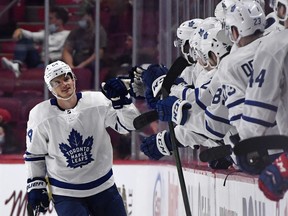 Toronto Maple Leafs forward David Kampf reacts with teammates after scoring a goal against the Montreal Canadiens during the second period at the Bell Centre in Montreal, Sept. 27, 2021.