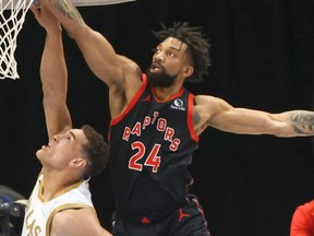 Raptors centre Khem Birch says he and his family were battling COVID-19.