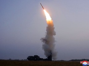 This picture taken on September 30, 2021 and released from North Korea's official Korean Central News Agency (KCNA) on October 1 shows a test-fire of a "newly developed" anti-aircraft missile carried out by the Academy of Defence Science of the DPRK.