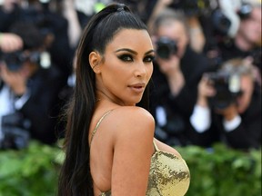 In this file photo taken on May 7, 2018, Kim Kardashian arrives for the 2018 Met Gala at the Metropolitan Museum of Art in New York.