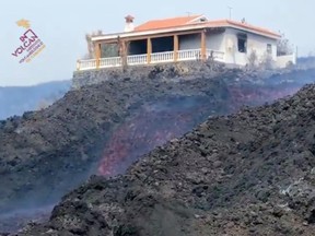 Lava flows in La Palma, Spain, Oct. 8, 2021, in this still image obtained from a social media video.