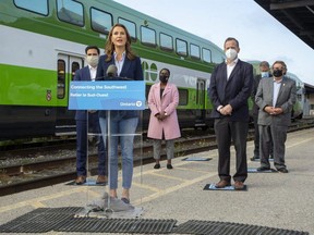 Ontario Minister of Transportation Caroline Mulroney speaks about the launch next week of GO Transit service in London at a news conference Wednesday, Oct. 13, 2021, at the Via Rail station on York Street in London. Listening are London North Centre MP-elect  Peter Fragiskatos, left, London West MP-elect Arielle Kayabaga, Elgin-Middlesex-London MPP Jeff Yurek, Metrolinx president and chief executive Phil Verster and London Mayor Ed Holder. (Derek Ruttan/The London Free Press)