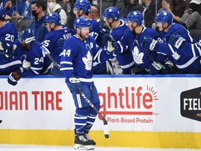 Toronto Maple Leafs defenceman Morgan Rielly (44) celebrates with team mates after scoring against Ottawa Senators in the first period at Scotiabank Arena.