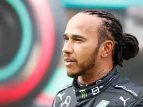 Mercedes' British driver Lewis Hamilton speaks to the press after the qualifying sessions at the Intercity Istanbul Park in Istanbul on Oct. 9, 2021, ahead of the Formula One Grand Prix of Turkey.