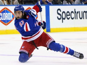 Rangers forward Mika Zibanejad takes a shot against the Islanders in a preseason game at Madison Square Garden in New York City, Sept. 26, 2021.