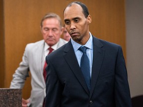 Former police office Mohamed Noor walks to the podium to be sentenced in the fatal shooting of Justine Ruszczyk Damond at the Hennepin County District Court in Minneapolis, Minnesota on June 7, 2019.