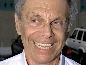 Satirist Mort Sahl arrives as a guest for Woody Allen's performance with Eddy Davis and His New Orleans Jazz Band Aug. 8, 2001 in Los Angeles.