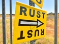 A sign directs people to the road that leads to the Bonanza Creek Ranch where the movie "Rust" is being filmed in Santa Fe, New Mexico, Oct. 22, 2021.