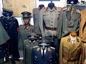 Nazi uniforms are seen in a home of an alleged pedophile in Rio de Janeiro, Brazil, in this handout photograph released on October 6, 2021.
