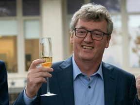Princeton University professor David MacMillan raises his glass in Princeton University, New Jersey after he was Awarded Nobel Prize In Chemistry on Oct. 6, 2021.