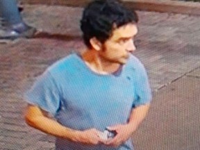 An image released by Toronto Police of a suspect in 10 break and enters in the Lakeshore Boulevard West and Parklawn Road area.