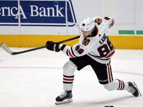 Patrick Kane of the Chicago Blackhawks takes a shot against the Dallas Stars at American Airlines Center on March 9, 2021 in Dallas.
