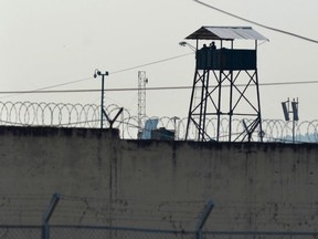 General view of the Guayas 1 prison on the outskirts of Guayaquil, Ecuador, taken on October 1, 2021 a day after police gained control following a riot between inmates which left at least 118 dead.