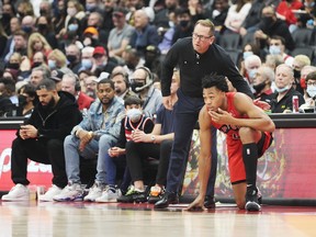 Scottie Barnes #4 of the Toronto Raptors talks with head coach Nick Nurse before going into the game against the Washington Wizards on Wednesday night.