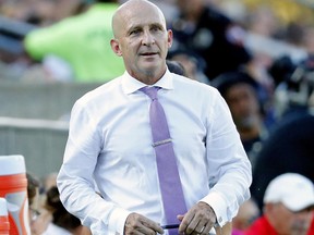 In this Oct. 27, 2019, file photo, Carolina Courage head coach Paul Riley watches from the sideline during the second half of an NWSL championship soccer game against the Chicago Red Stars in Cary, N.C.