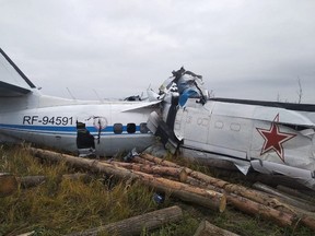 This handout picture taken and released on Sunday, Oct. 10, 2021 shows a wreckage at a site of the L-410 plane crash near the town of Menzelinsk in the Republic of Tatarstan.