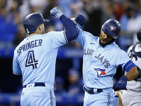What it George Springer (left) had been healthy all sesaon? And will Marcus Semien return? These are two big questions for the Blue Jays to look back on and ahead to.