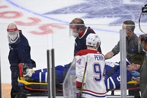 Maple Leafs captain John Tavares is stretchered off the ice during Game 1 of Toronto’s series against the Montreal Canadiens in last season’s playoffs. THE CANADIAN PRESS FILES