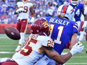 Washington Football Team cornerback Benjamin St-Juste breaks up a pass intended for Buffalo Bills wide receiver Cole Beasley.