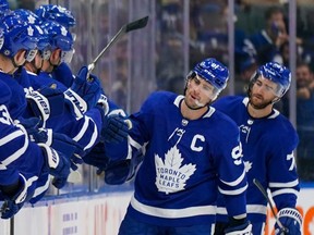 John Tavares celebrates a goal against Ottawa in the pre-season. THE CAANDIAN PRESS