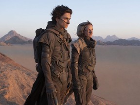 Timothee Chalamet and Rebecca Ferguson in a scene from Dune