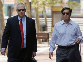 Los Angeles financier Morrie Tobin (R) arrives at the federal courthouse for a hearing in a nationwide college admissions cheating scheme, in Boston, Massachusetts, U.S., August 12, 2020.