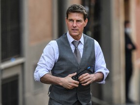In this file photo taken on October 6, Tom Cruise is pictured during the filming of "Mission: Impossible" in Rome.