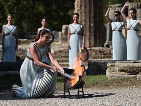 Xanthi Georgiou prior to setting the Olympic Torch alight at the Lighting Ceremony Of The Olympic Flame on October 18, 2021 in Olympia, Greece.