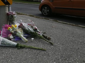 Flowers at the scene of a fatal accident at the corner of Birchmount and Danforth Aves.