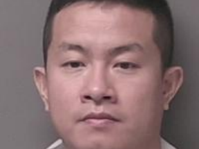 Zhen Hao Song, 35, is wanted for arrest on seven charges after a suspect fled the scene during one of the search warrants.