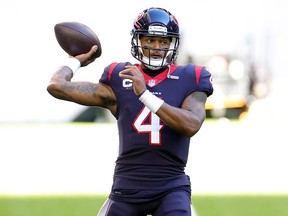 Deshaun Watson of the Houston Texans participates in warmups prior to a game against the Tennessee Titans at NRG Stadium on January 3, 2021 in Houston.