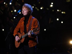 British singer-songwriter Ed  Sheeran performs on stage during the inaugural Earthshot Prize awards ceremony at Alexandra Palace in London, Oct. 17, 2021.