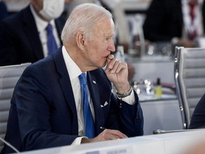 US President Joe Biden reacts during a meeting at the G20 leaders' summit in Rome on October 30, 2021.