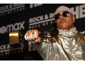 LL Cool J poses in the press room following his induction into the Rock and Roll Hall of Fame in Cleveland, Ohio on Oct. 30, 2021.