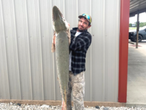 A 4.5-foot, 39.5-pound gar was pulled from the Neosho River in Kansas by angler Danny Lee "Butch" Smith.